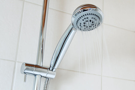 chrome shower head with water thumbnail