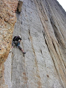 person climbing on mountain thumbnail