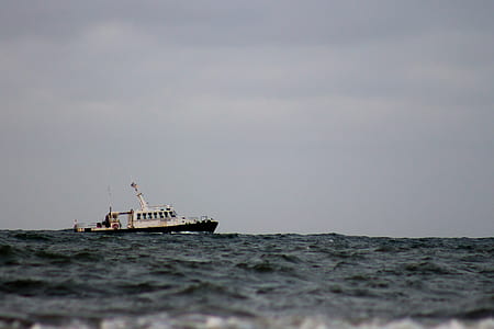 boat sailing on ocean thumbnail