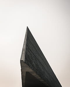 brown wooden roof under white sky thumbnail