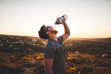 time lapse photography of man drinking water thumbnail