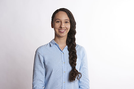woman wearing light blue dress shirt thumbnail