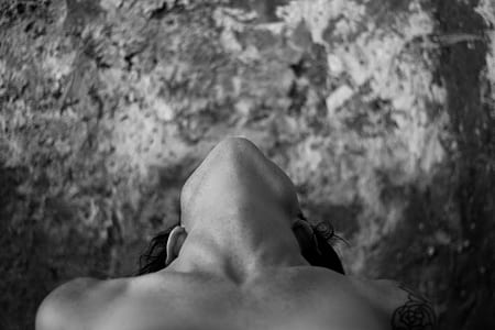 grayscale photography of woman looking up thumbnail