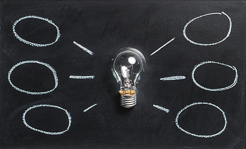 clear light bulb on black chalkboard thumbnail