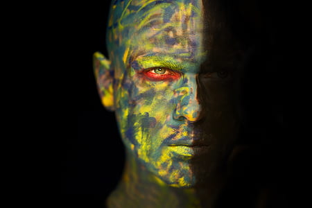 man's face full of paints thumbnail