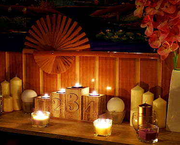 six lighted candles on table thumbnail