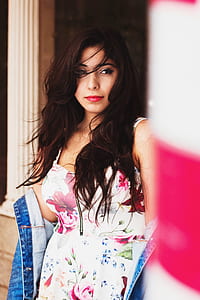 woman wearing white, red, and green floral sweetheart neckline dress thumbnail