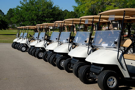 white golf cart on parking area thumbnail