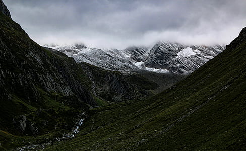 Mountain Valley Under Cloudy Sky thumbnail