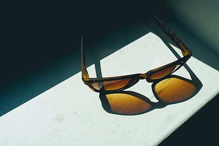 closeup photo of brown framed sunglasses thumbnail