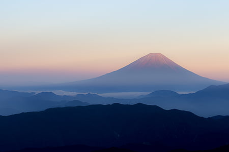 volcano illustration under the clear sky during daytime thumbnail
