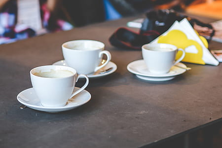 white ceramic cups on surface thumbnail