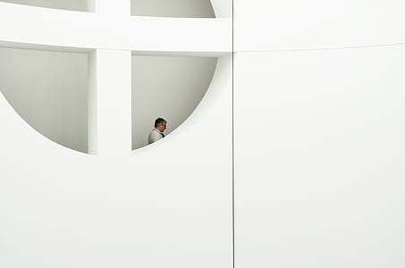 man standing on building thumbnail