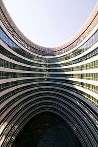 curtain wall building during daytime thumbnail