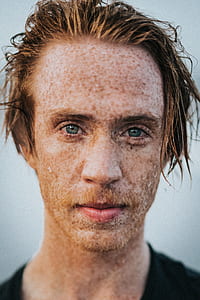shallow focus photography of man over white background thumbnail