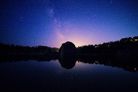 silhouette of gray rock mountain during nighttime thumbnail