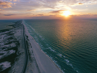 road between body of water thumbnail
