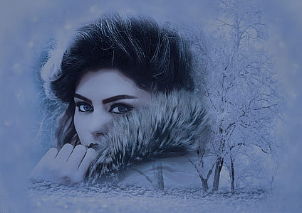 woman's face with trees covered by snow photo thumbnail