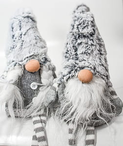 two white-and-grey fur hats thumbnail