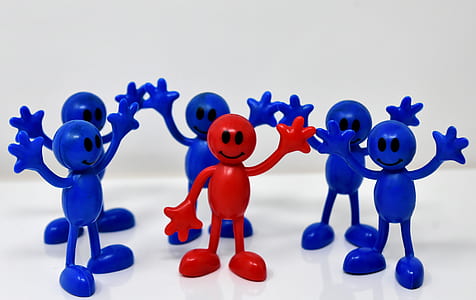 red stickman surrounded by five blue stickman figurines thumbnail