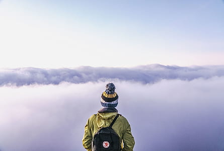 person wearing bubble hat and backpack thumbnail