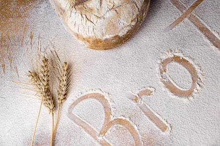 wheat stalks on table with flour thumbnail