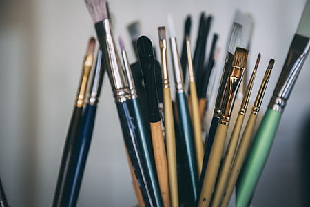 selective focus photography of paintbrushes thumbnail
