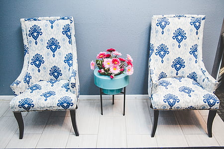 two white-and-blue floral sofa chairs thumbnail