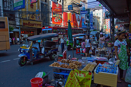 Urban photo of the busy streets of the Chinatown district of Bangkok in Thailand thumbnail
