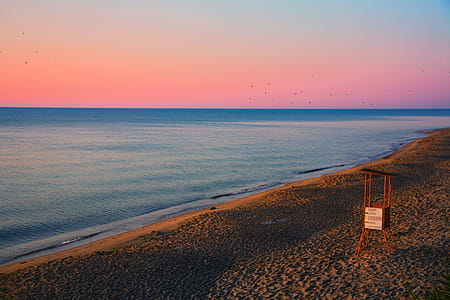 Lifeguard Tower Near Body Of Water thumbnail
