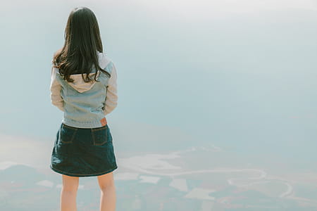 Photography of Woman Wearing Hooded Jean Jacket thumbnail