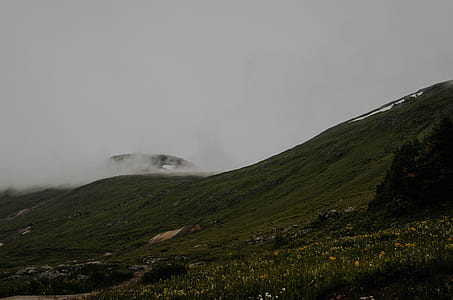 landscape photography of mountains covered by clouds thumbnail