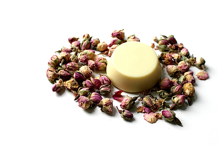flan beside purple flowers on top of white surface thumbnail