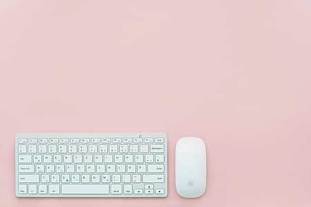 white Apple wireless keyboard and mouse thumbnail