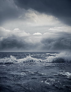 blue body of water under white clouds thumbnail