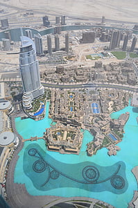bird eye photography of gray concrete building near body of water thumbnail
