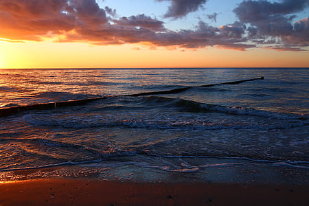 ocean waves under cloudy skies thumbnail
