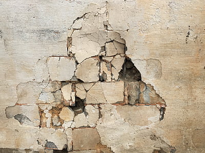 wrecked beige concrete wall thumbnail