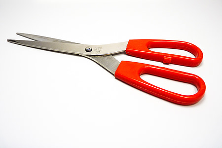 silver and red scissors on white surface thumbnail