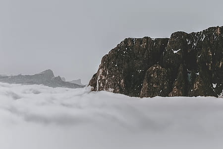 Rock Formation Surrounded by Clouds thumbnail