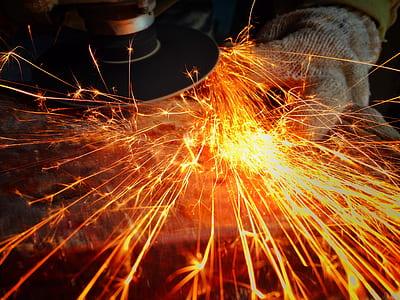 person using disc grinder polishing metal thumbnail