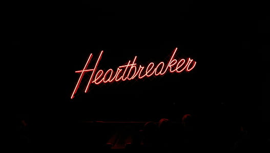 pink heartbreaker text on black background thumbnail
