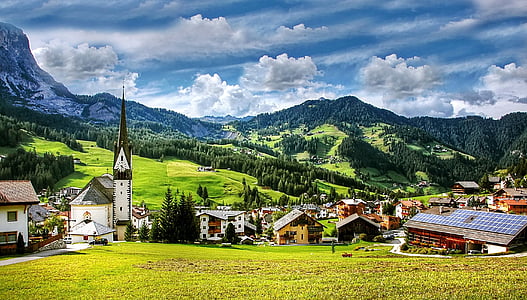 houses near mountains painting thumbnail