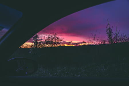 Person Inside Vehicle during Golden Hour thumbnail