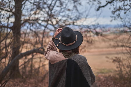 woman wearing black fedora hat thumbnail
