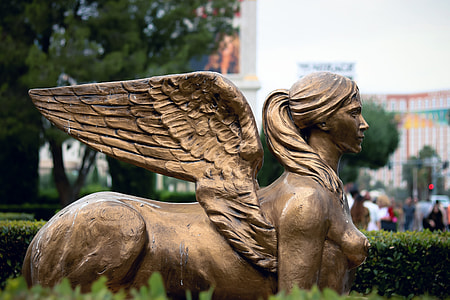 bronze-colored statue thumbnail