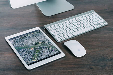 silver iPad on top of table thumbnail
