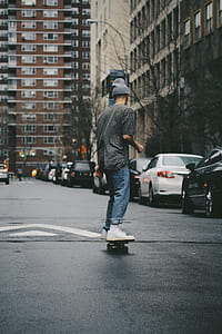 man riding on skateboard thumbnail