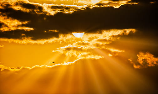 Airplane Flying During Golden Hour thumbnail