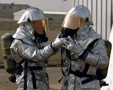 two person wearing hazard suits thumbnail